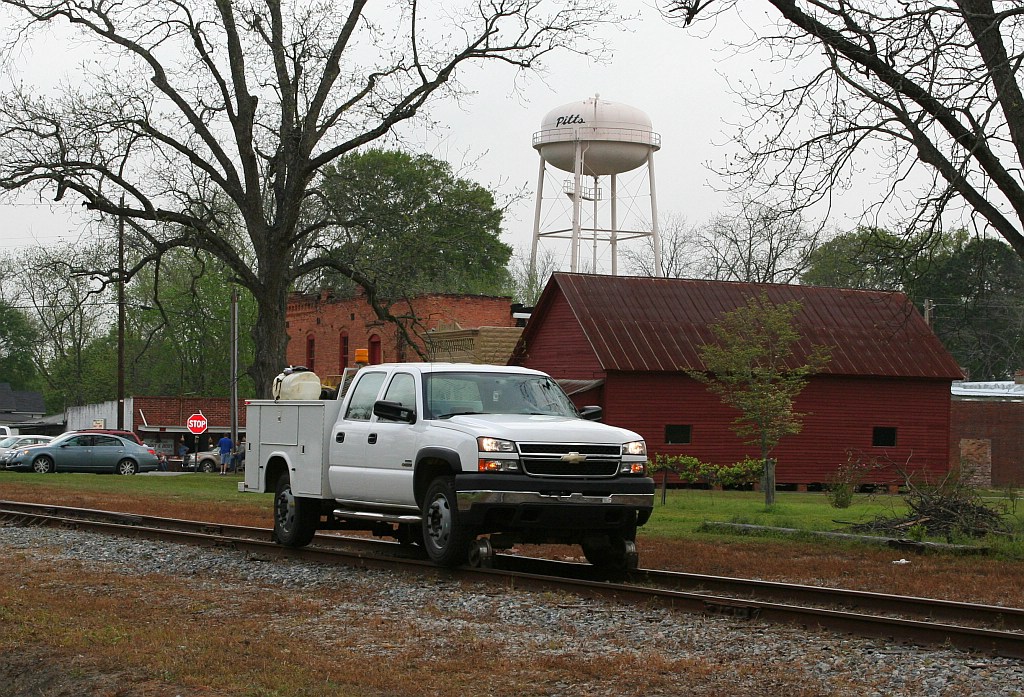 HOG pilot in hi-railer for motocar run