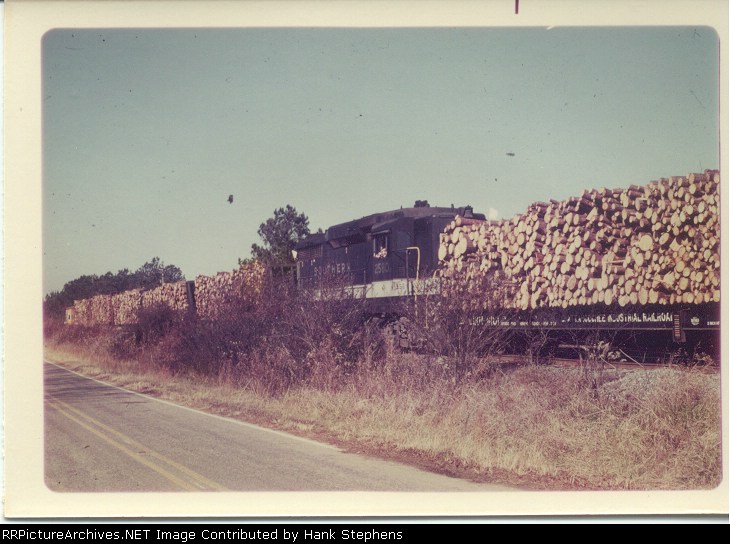 Sorting out loaded pulpwood racks at Welch