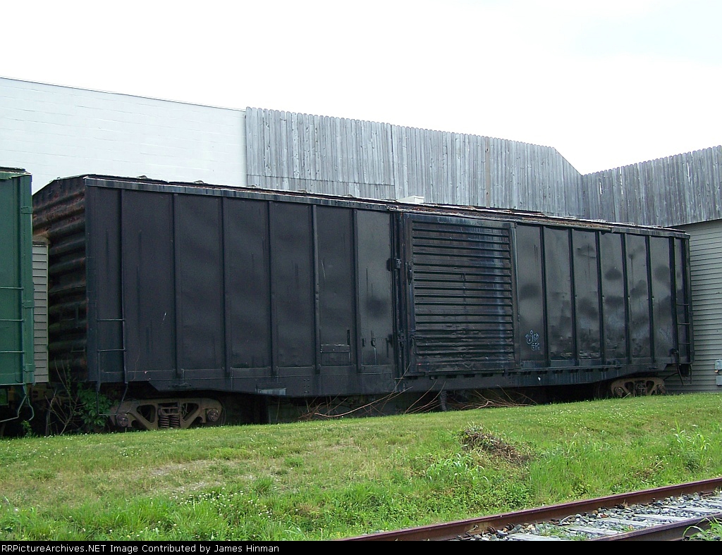 There's a long black train,