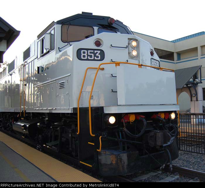 Front view of Metrolink 853 in the new scheme