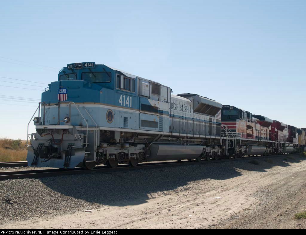 UP 4141 leads an EB doublestack at 12:34pm 