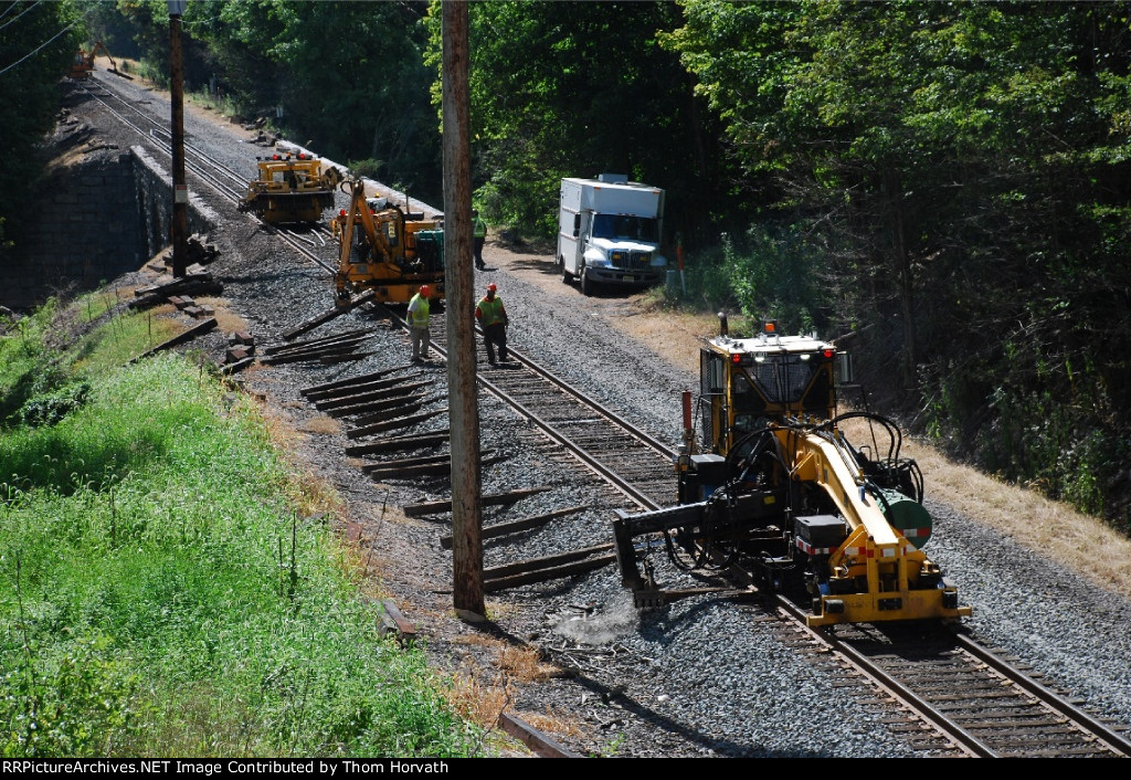 NJT's TX 801 is seen extracting a tie for replacement on the RVL