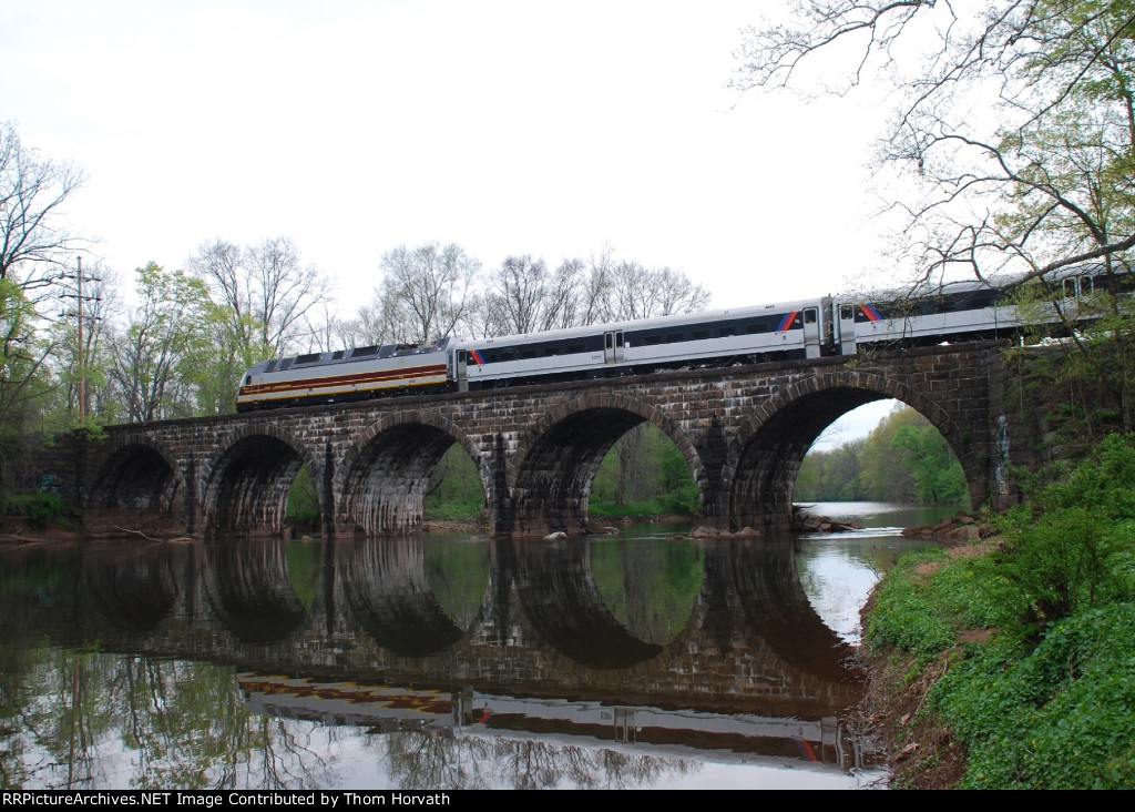 NJT Train 5170 heads east over the Raritan River on this gray day