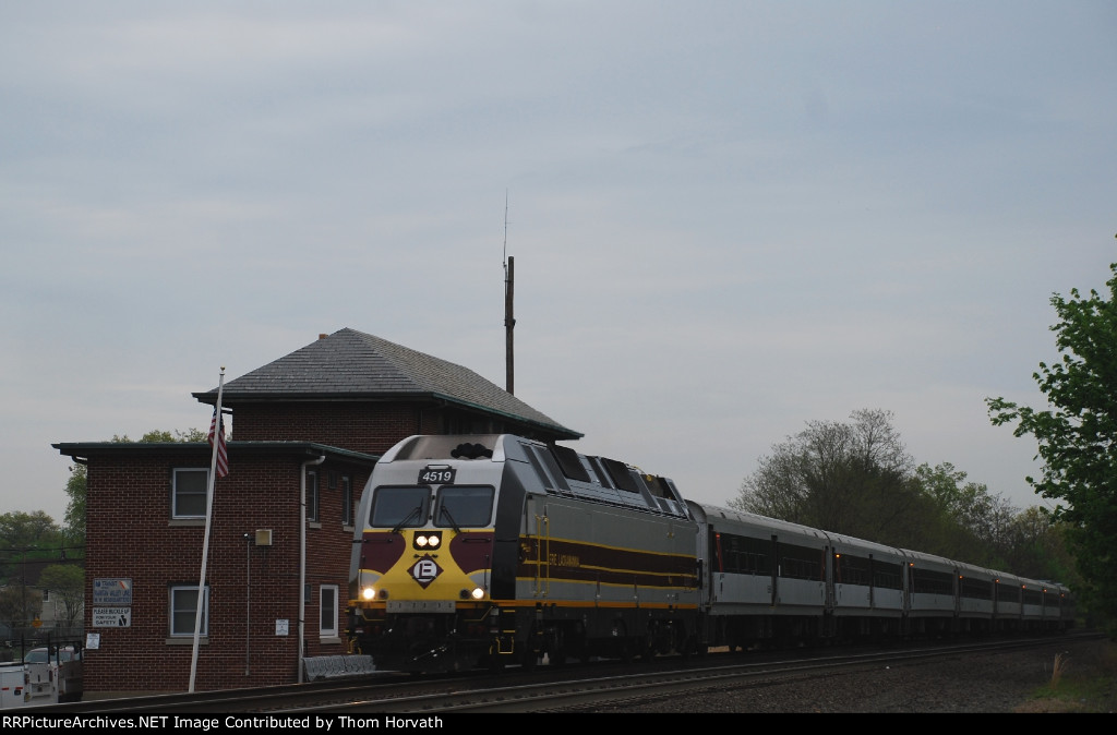 NJT Train 5711 passes by the RVL's BOYD Tower