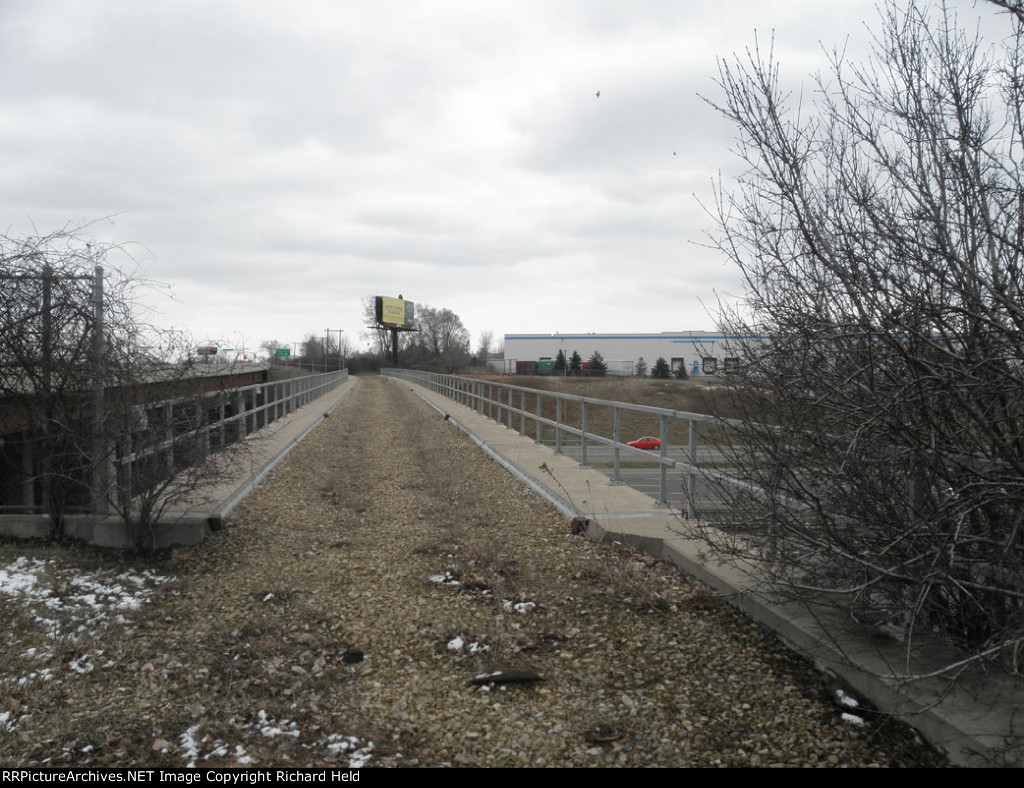 Empty Bridge Over Restless Roads