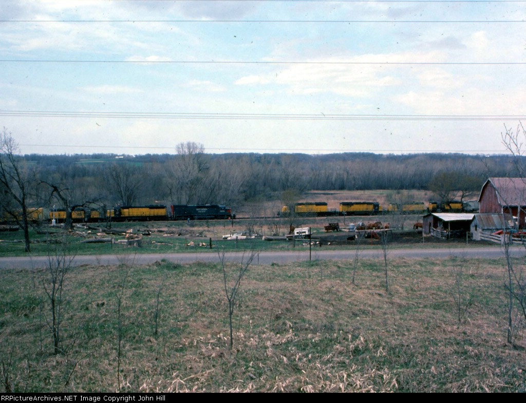 1224-36 C&NW freights meet on ex-CMO passing siding
