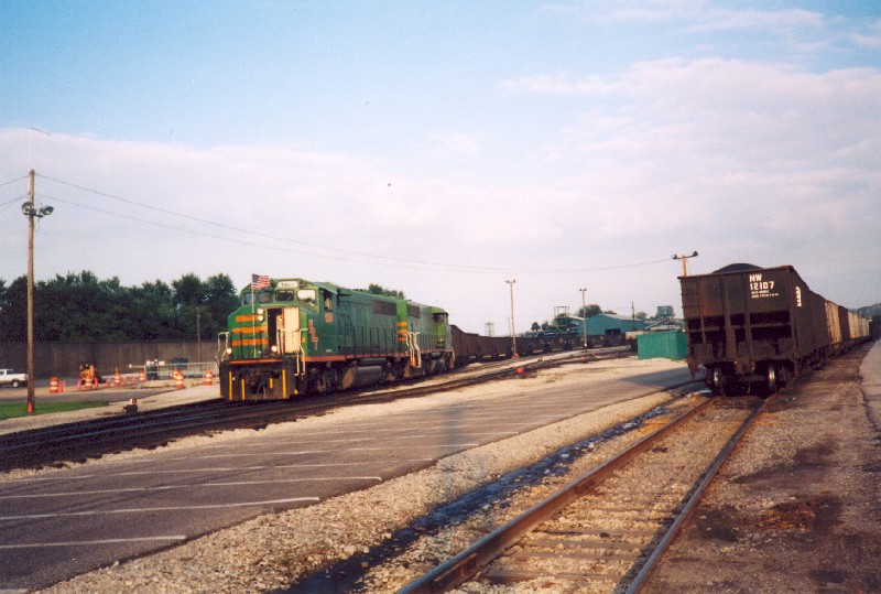 KRT engines pushing coal hoppers into unloading facility.