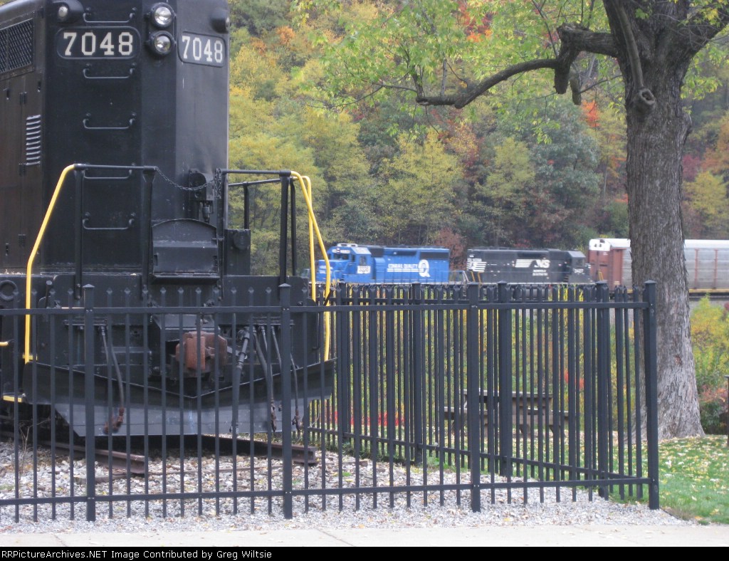A set of NS SD40-2's help a train past PRR 7048