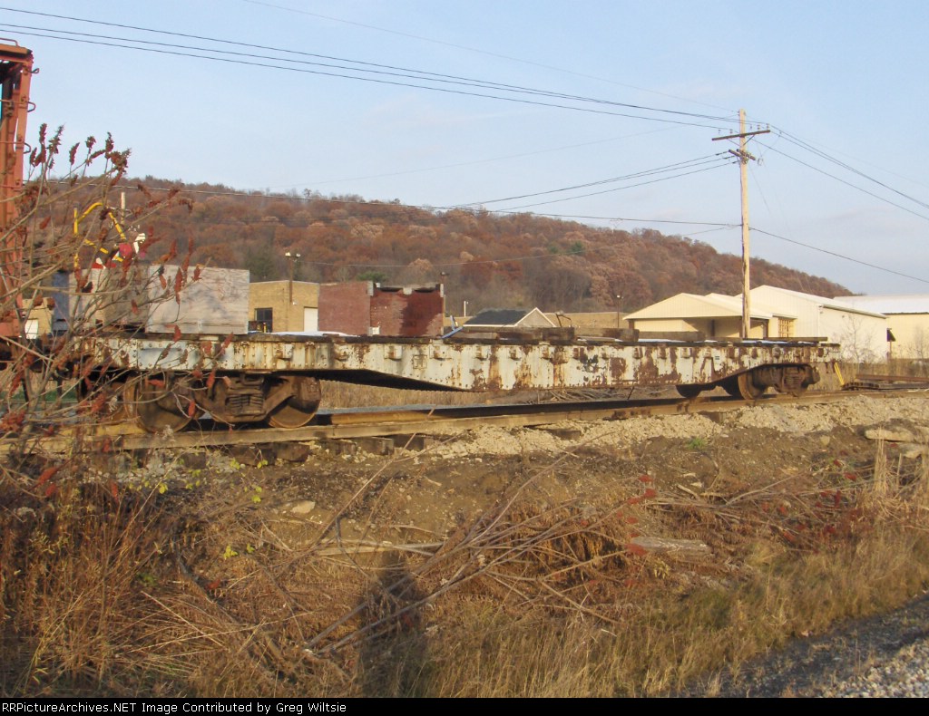 Unlettered flatcar at Warren Rail Car
