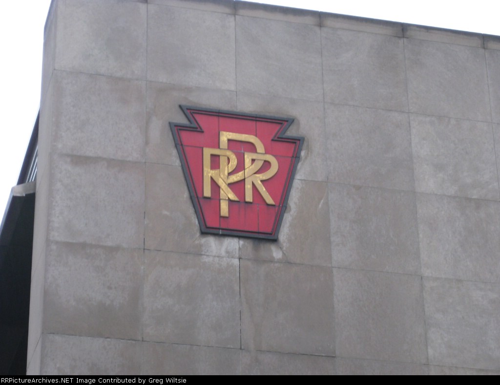 PRR keystone on platform building at Amtrak station