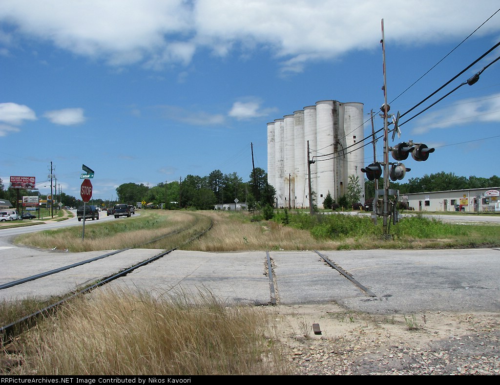 Abandoned grain elevator along the weedgrown Gainesville Midland