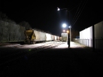 Loading a grain train at night.