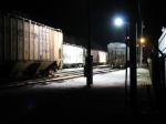 Loading a grain train at night.