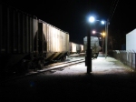 Loading a grain train at night.