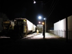 Loading a grain train at night.