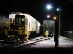 Loading a grain train at night.