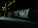 Loading a grain train at night.