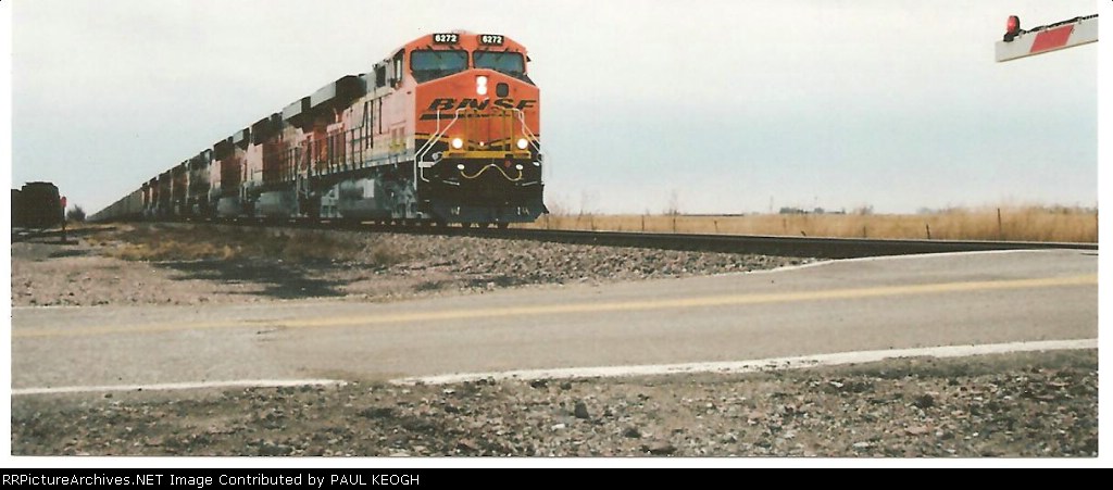 bnsf 6272 rolls west towards Aurora, NE with an empty coal train.