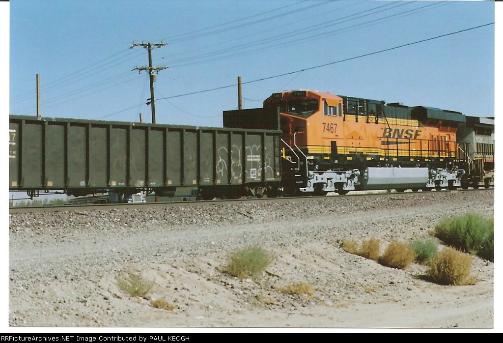 BNSF 7467 rolls west as a rear DPU on a manifest train.