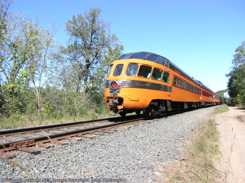 bringing up the rear in fine style