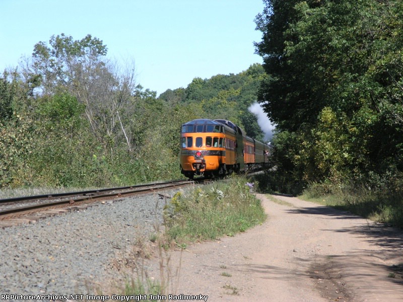 bringing up the rear in fine style