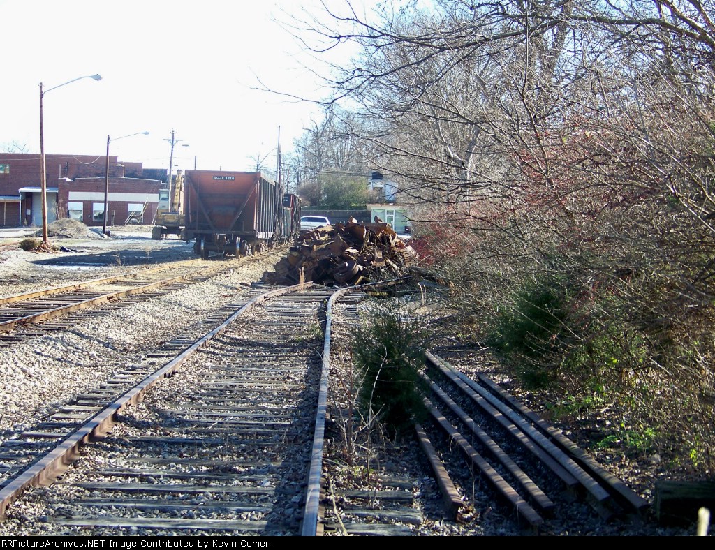 Piles of scrap await loading at the end of the Glasgow Branch