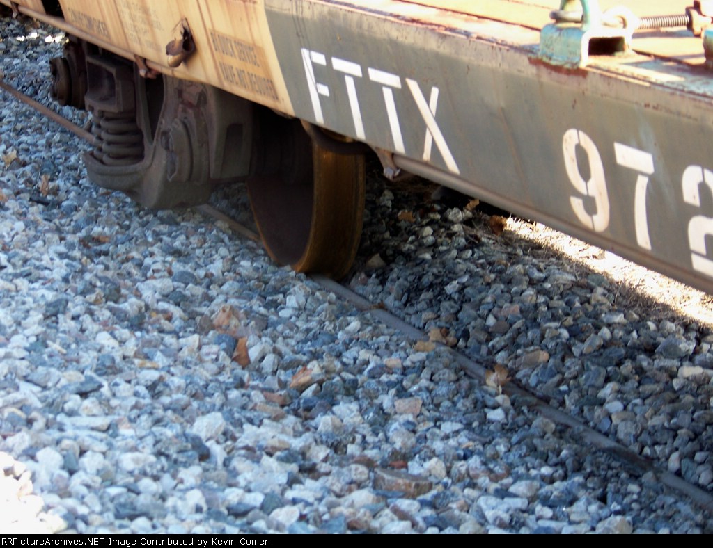 The ballast almost covers the rails on the track where these cars sit 1/1/2009
