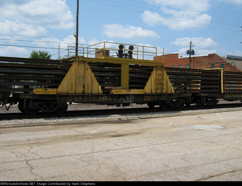 CSX 973243 on WO18 Rail Train ferrying rail for Kia