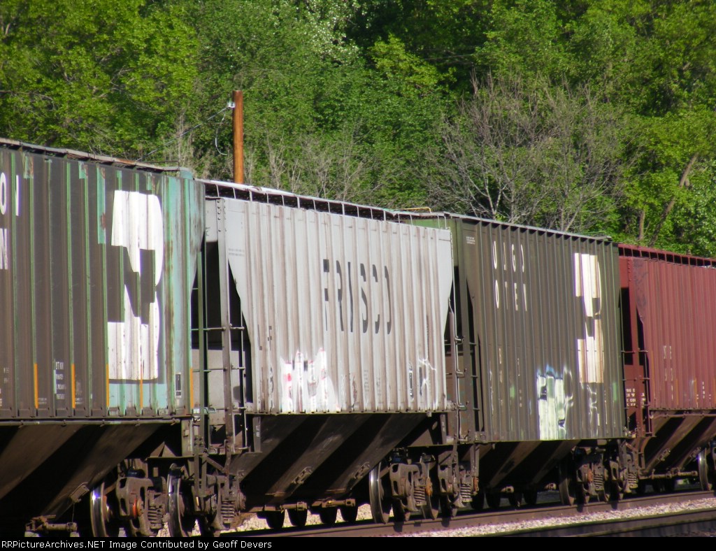 A Frisco Between 2 BN Cars