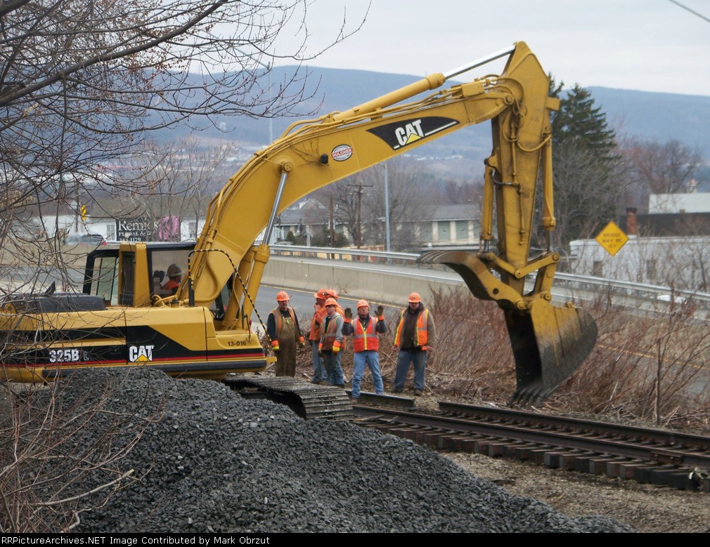 Working on track at derailment