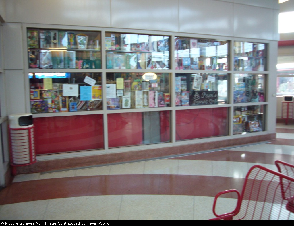 A toy store in a railroad station that apparently doesn't sell model trains
