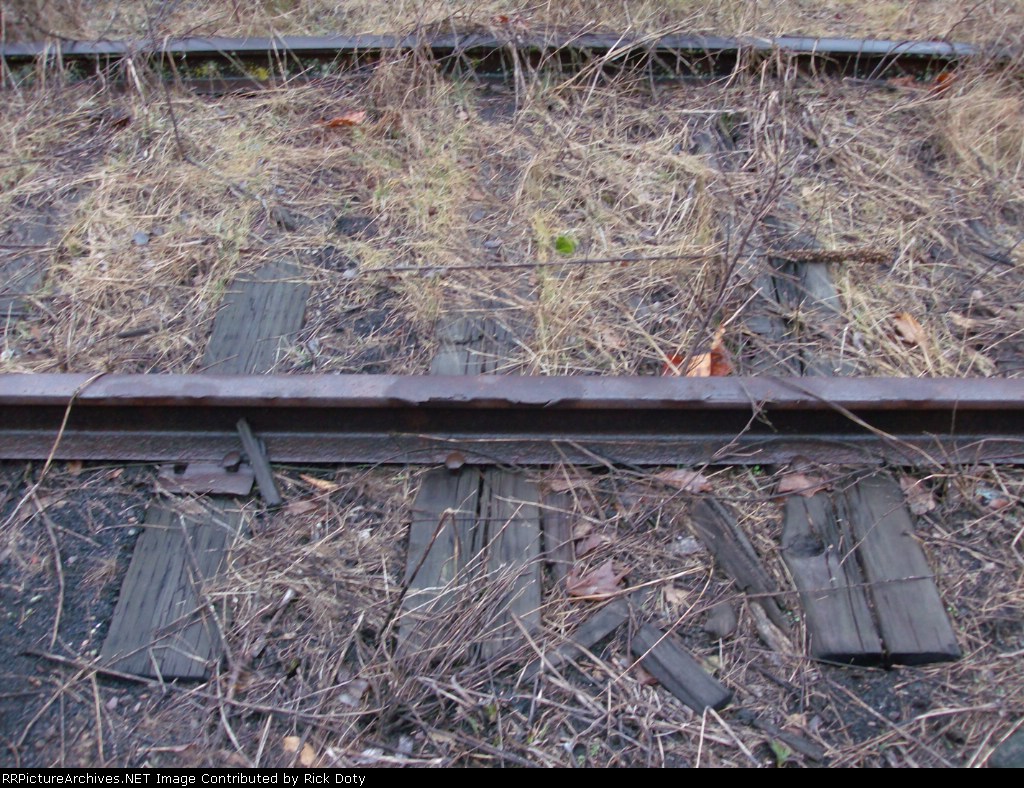 Very old light weight rail former small yard of the CNW