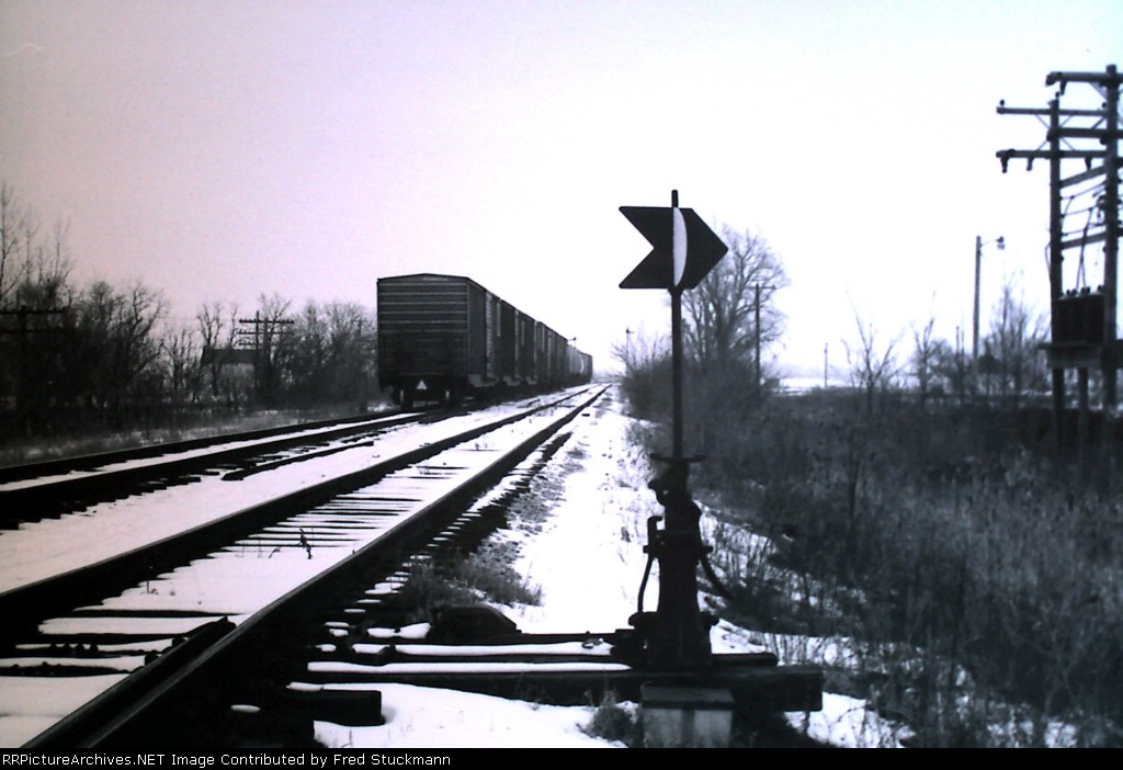 Westbound is a siding and the 203 is in an industry. Nice high stand switch.