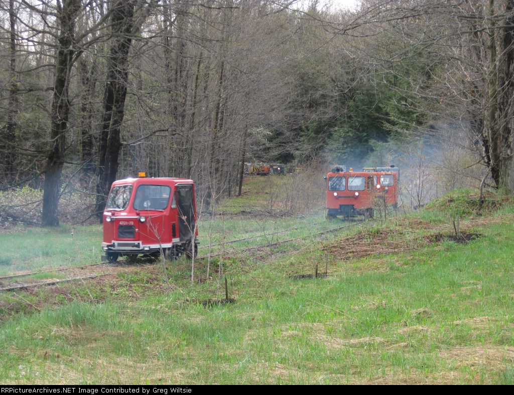 One of the cars smoke it up as others come towards the Route 66 crossing