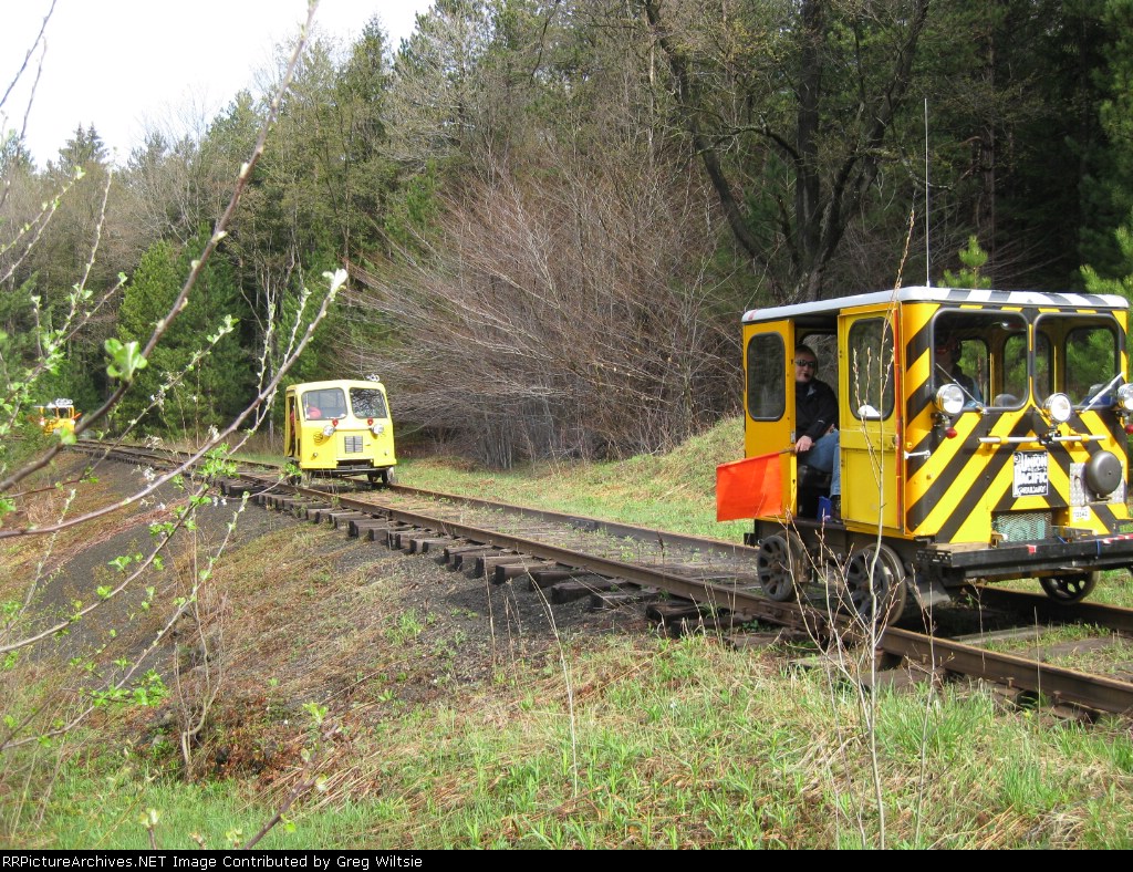 A woman in the Union Pacific car warns the cars behind that they are slowing for the upcoming crossing