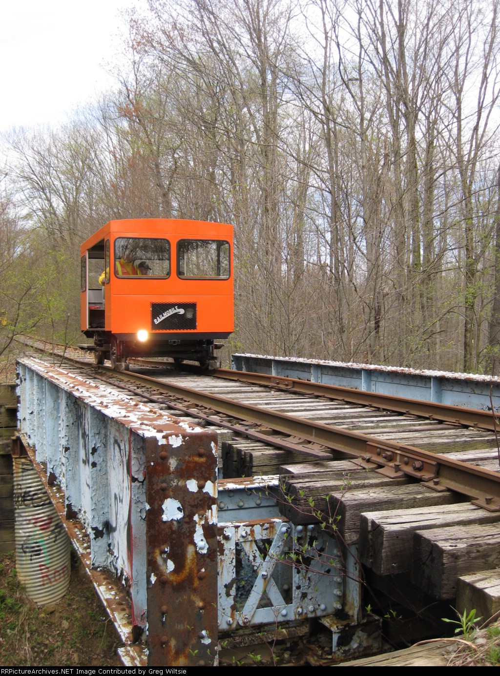 One of the "A" cars head over a steel bridge