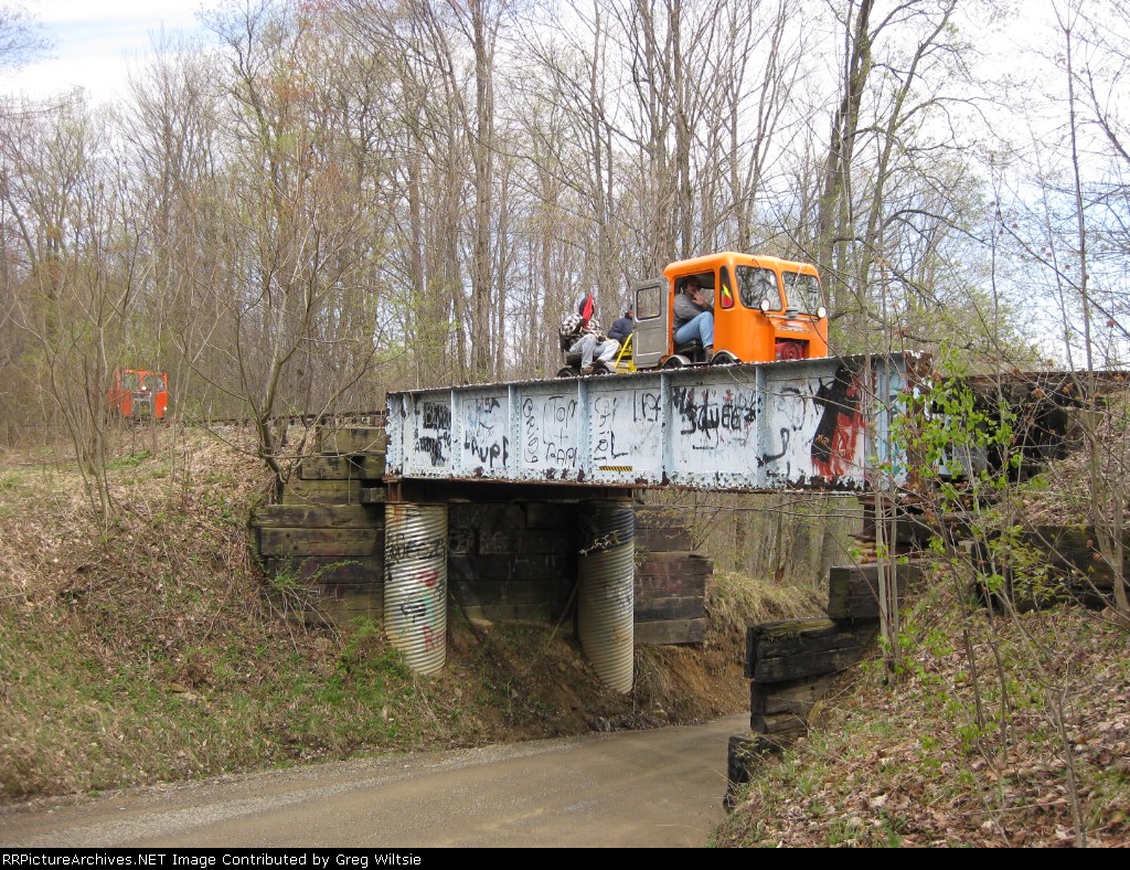 The towed car passes over the bridge