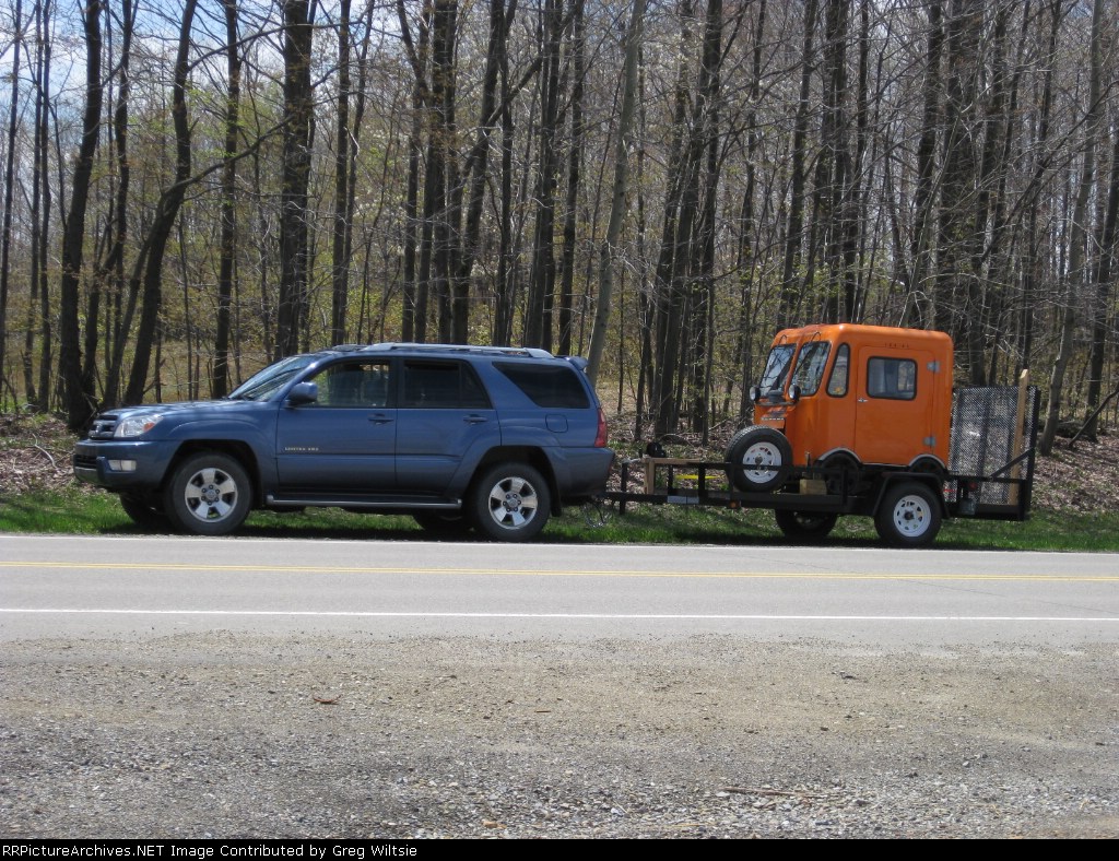 Outside of Kane, the owners of the car with the broken axle make their way along with the rest of the group to flag the crossings