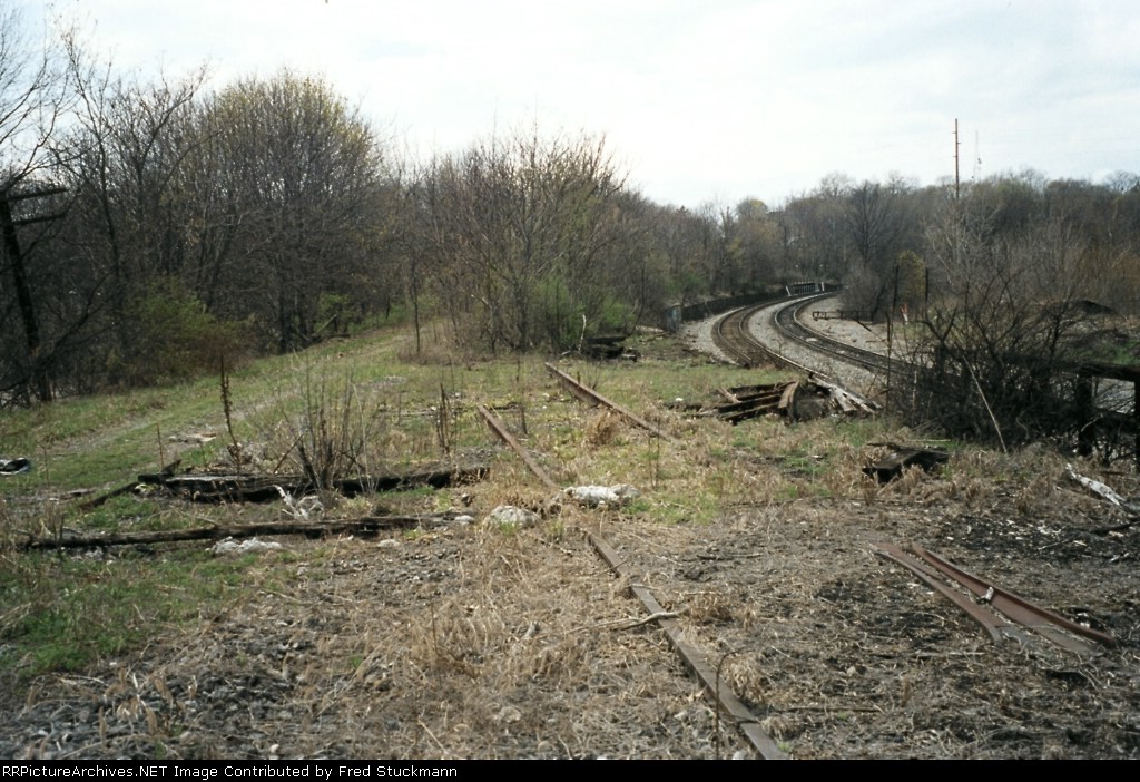 From left to right: tire tracks; eastbound. Ties; westbound. Diagonal track; track into transfer. Finally CSX main.