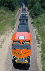 BNSF 9131 with a westbound empty hopper train on the Ravenna Sub