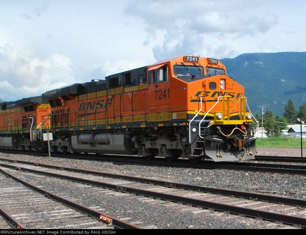 BNSF 7241 still looking clean for 4 months old rolls west with a Grain train.