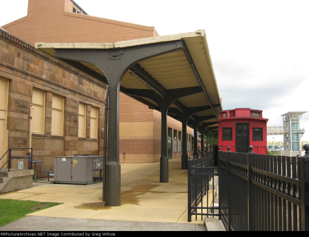The old station platform and caboose located at Station Square