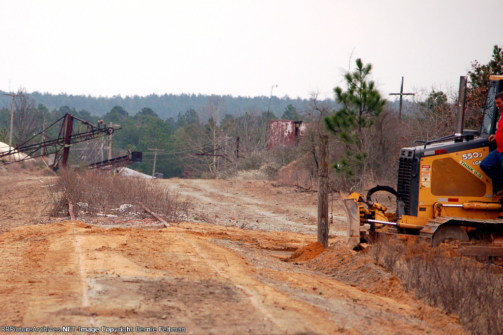 CSX Bulldozer BD 900203 is clearing the sand/dirt mound off Brown Brothers sand pit lead to the loaders 