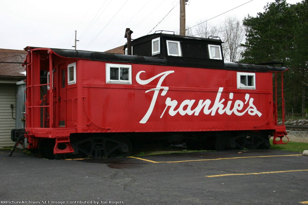 PRR caboose equipped with Champion windows sits near CP Cowling