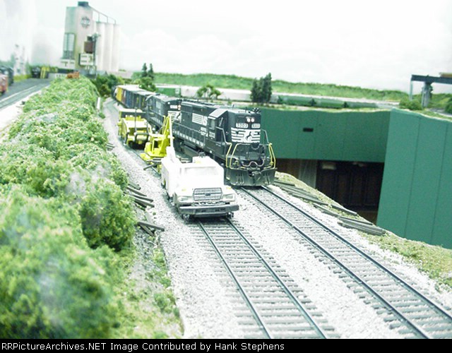 Road train passing a tie patch gan near Bleeker, AL