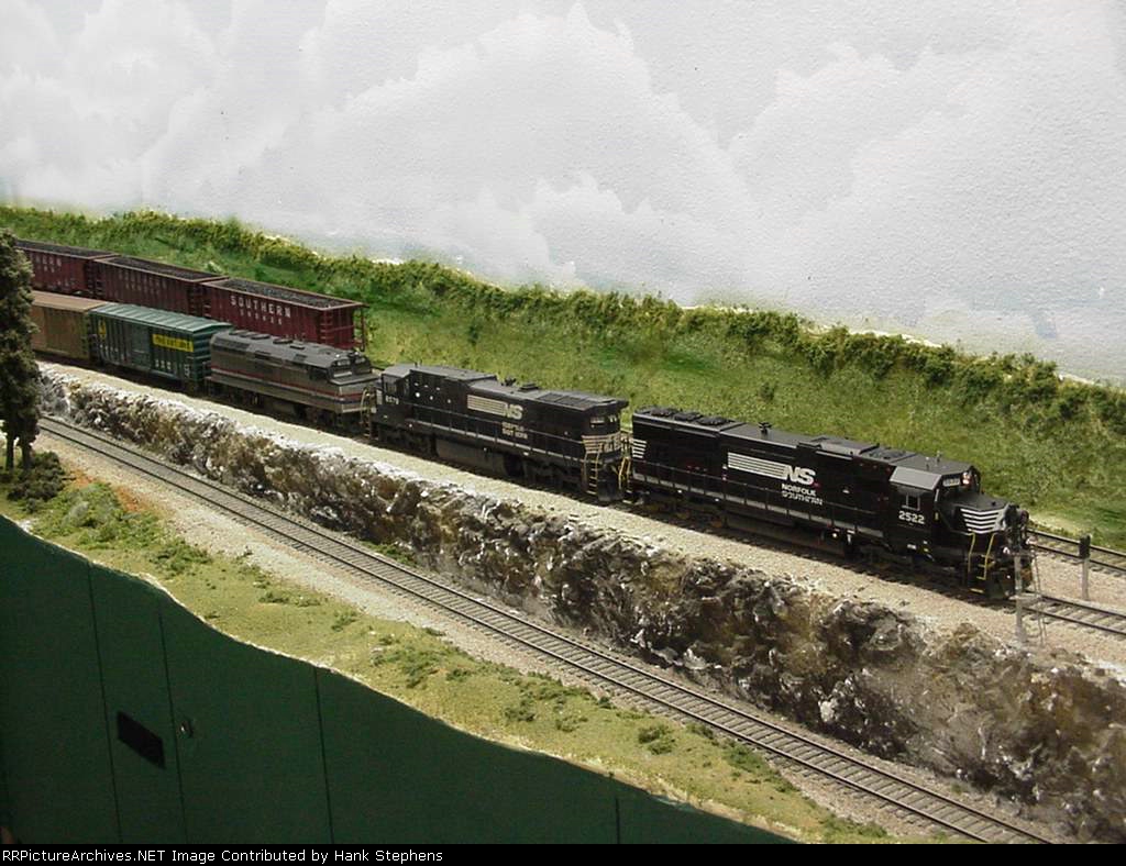 NS will do anything to keep train moving, even in power shortages.  This includes leasing surplus AMTK F40s and running new engines in primer to get them online faster