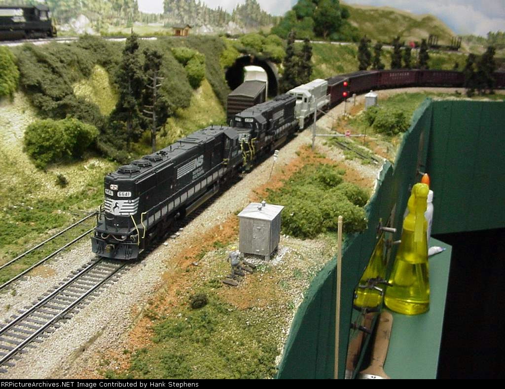 NS Radio Remote Coal--NS SD units marshall a long Southern coal train with a primered unit holding the third position in consist.