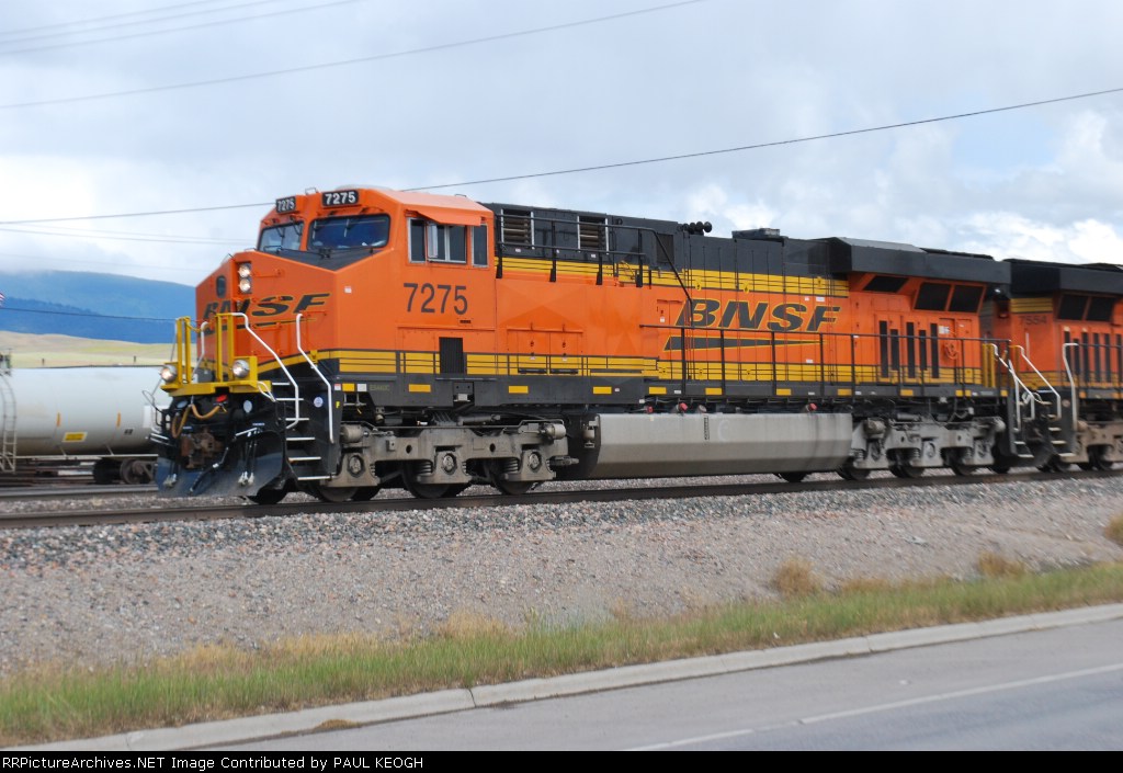 BNSF 7275 pulls west out of the MRL Yard with a laoded Grain train towards BNSF Hauser, Idaho.