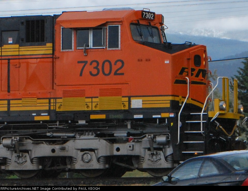 BNSF 7302 close up as she rolls east towards Helena, MT with a manifest train.