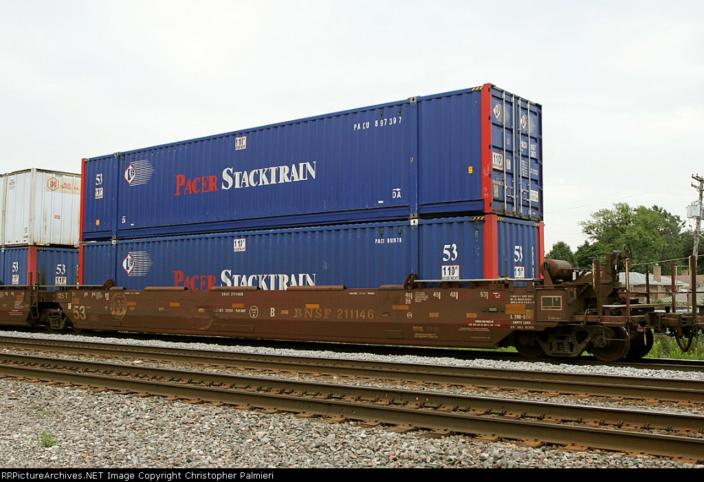 BNSF 211146 B loaded with PACU 897397 and PACU 892078
